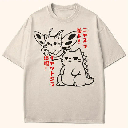 Kyattojira X Nyasura Arrives T-Shirt Ivory / S 18672316446576264072 T-Shirt