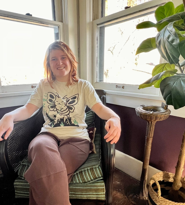 The gift Denise C. gave: a Nyasura tee, worn and loved